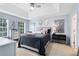Main bedroom with natural light, neutral tones, carpet flooring, and a ceiling fan at 449 Cruz Bay Cir, Winter Springs, FL 32708