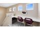 Office space with a built-in desk and carpet flooring at 449 Cruz Bay Cir, Winter Springs, FL 32708