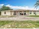 Charming one-story home with a long driveway and front porch offers curb appeal and ample parking at 516 Petes Ln, Davenport, FL 33837