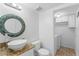Bathroom with decorative mirror, vessel sink, granite countertop and tile floor at 7475 Canford Ct # 21, Winter Park, FL 32792