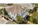 Aerial view of a home showcasing a front porch, backyard, and landscaping at 859 Easley Ave, Winter Garden, FL 34787