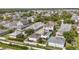 Aerial view of a home featuring an in-ground pool and a charming backyard in a residential neighborhood at 859 Easley Ave, Winter Garden, FL 34787