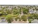 Aerial view of a neighborhood showcasing mature trees, green spaces, and a well-maintained streetscape at 859 Easley Ave, Winter Garden, FL 34787