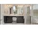 Bathroom featuring double sinks, quartz countertops, dark wood cabinets, and a tiled shower at 859 Easley Ave, Winter Garden, FL 34787