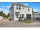 Two-story home exterior with a driveway, fenced yard, and an attached garage at 859 Easley Ave, Winter Garden, FL 34787