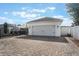 A detached two car garage with an extended brick driveway and a partial view of the pool at 859 Easley Ave, Winter Garden, FL 34787