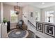 Cozy upstairs hallway with hardwood floors and stylish decor with lots of natural light at 859 Easley Ave, Winter Garden, FL 34787