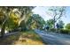 Residents enjoying a biking ride along the paved path by the lake at 859 Easley Ave, Winter Garden, FL 34787