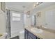 Well-lit bathroom with a modern vanity, tub/shower combination, and neutral décor at 8622 La Isla Dr, Kissimmee, FL 34747