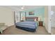 Spacious bedroom with windows, new carpet, and ensuite bath at 8622 La Isla Dr, Kissimmee, FL 34747