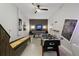 Large game room equipped with shuffleboard, foosball, and an air hockey table at 9227 Sommerset Hills Dr, Davenport, FL 33896