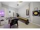 Spacious game room with foosball, shuffleboard, and fun decorative accents at 9227 Sommerset Hills Dr, Davenport, FL 33896