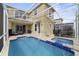 Inviting screened-in pool and spa area, perfect for relaxation and outdoor fun at 9227 Sommerset Hills Dr, Davenport, FL 33896