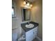 Bathroom featuring neutral wall color, tile flooring, single sink vanity, and offering a functional design for everyday needs at 1000 S Semoran Blvd # 608, Winter Park, FL 32792