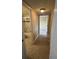 Hallway with tile flooring leading to the bathroom and bedroom at 1000 S Semoran Blvd # 608, Winter Park, FL 32792