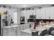 Bright kitchen boasts stainless appliances, granite countertops, and ample storage at 10078 Hampshire Oaks Dr, Orlando, FL 32825