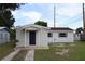 Charming single-story home featuring a driveway and inviting covered entrance at 102 Luna Rd, Auburndale, FL 33823