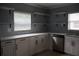Bright kitchen featuring modern white cabinets, sleek countertops, and stainless steel appliances at 102 Luna Rd, Auburndale, FL 33823