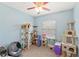 The bedroom, painted in a soft blue, is designed for cats with custom climbing frames and platforms at 10308 Belfry Cir, Orlando, FL 32832