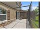 Screened patio features brick pavers and direct access to the backyard at 10308 Belfry Cir, Orlando, FL 32832
