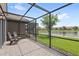 Screened patio features brick pavers and a great view of the pond at 10308 Belfry Cir, Orlando, FL 32832