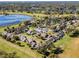 Scenic aerial view of the community, showcasing landscaping and proximity to lake at 1126 Villa Ln # 91, Apopka, FL 32712