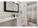 Bright bathroom featuring a modern vanity, stylish mirror, and shower-tub combination at 1126 Villa Ln # 91, Apopka, FL 32712