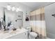 Bathroom features a vanity with marble countertops and a tub/shower combo at 1126 Villa Ln # 91, Apopka, FL 32712