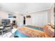 Bedroom boasts an ensuite bathroom, closet, and dedicated workstation at 1126 Villa Ln # 91, Apopka, FL 32712
