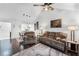 Bright living room with view of the kitchen, and comfortable seating at 1126 Villa Ln # 91, Apopka, FL 32712