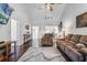 Cozy living space featuring comfortable furnishings and a seamless flow to the kitchen at 1126 Villa Ln # 91, Apopka, FL 32712