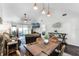 Spacious living room with vaulted ceilings, and seamless access to screened patio at 1126 Villa Ln # 91, Apopka, FL 32712