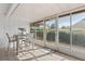 Enclosed patio featuring tile flooring, a seating area, and plenty of natural light at 1126 Villa Ln # 91, Apopka, FL 32712