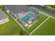 Aerial view of the property featuring a pool, fenced yard, and outdoor seating area with a fire pit at 1171 Lebanon Ct, Sanford, FL 32771