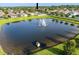 An aerial view of a pond in a community at 1171 Lebanon Ct, Sanford, FL 32771