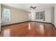 Spacious bedroom with ceiling fan and windows providing natural light at 140 Seville Chase Dr, Winter Springs, FL 32708