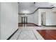 Spacious foyer with tile and wood flooring that opens into the dining and living areas at 140 Seville Chase Dr, Winter Springs, FL 32708