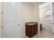 Bathroom featuring tile floors and a vanity with granite countertops at 15208 Avenue Of The Arbors, Winter Garden, FL 34787