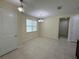 Bright dining area with tile flooring, modern chandelier, and a large window for natural light at 15208 Avenue Of The Arbors, Winter Garden, FL 34787