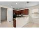 Kitchen featuring tile flooring, granite countertops, a breakfast bar and stainless appliances at 15208 Avenue Of The Arbors, Winter Garden, FL 34787
