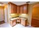 Built-in desk area with cabinetry and granite countertop; great for a home office at 1550 Kevin Ln, Deland, FL 32724