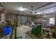 Interior view of garage with overhead lights and equipment at 1550 Kevin Ln, Deland, FL 32724