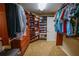 Expansive walk-in closet with custom shelving and ample storage for clothing and accessories at 1550 Kevin Ln, Deland, FL 32724