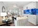 Inviting living room with neutral tones, plush seating, and a custom built-in aquarium for added ambiance at 15606 Montesino Dr, Orlando, FL 32828