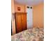 Bedroom featuring wooden wardrobe and colorful accents at 1717 Se 190Th Ave, Silver Springs, FL 34488