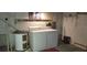 Laundry room with washer, dryer, and hot water heater at 1717 Se 190Th Ave, Silver Springs, FL 34488