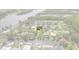 Stunning aerial view of waterfront property with lush landscaping and canal access at 1721 Perch Ln, Sanford, FL 32771