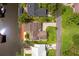 Stunning waterfront home with tile roof, lush landscaping, and private dock on a serene canal at 1721 Perch Ln, Sanford, FL 32771