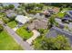Charming waterfront home with a paver driveway, well-manicured lawn, and access to a canal at 1721 Perch Ln, Sanford, FL 32771