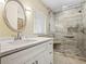 Bathroom featuring a glass shower, vanity with marble countertop, and neutral paint at 1721 Perch Ln, Sanford, FL 32771